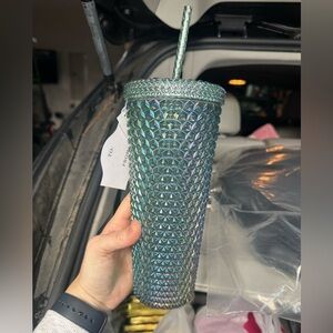 Iridescent textured cup with lid and straw